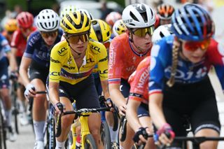 Kasia Niewiadoma following Demi Vollering at the Tour de France Femmes 2024 stage seven