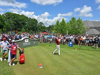 Adam Scott hitting his opening tee shot at the Travelers Championship