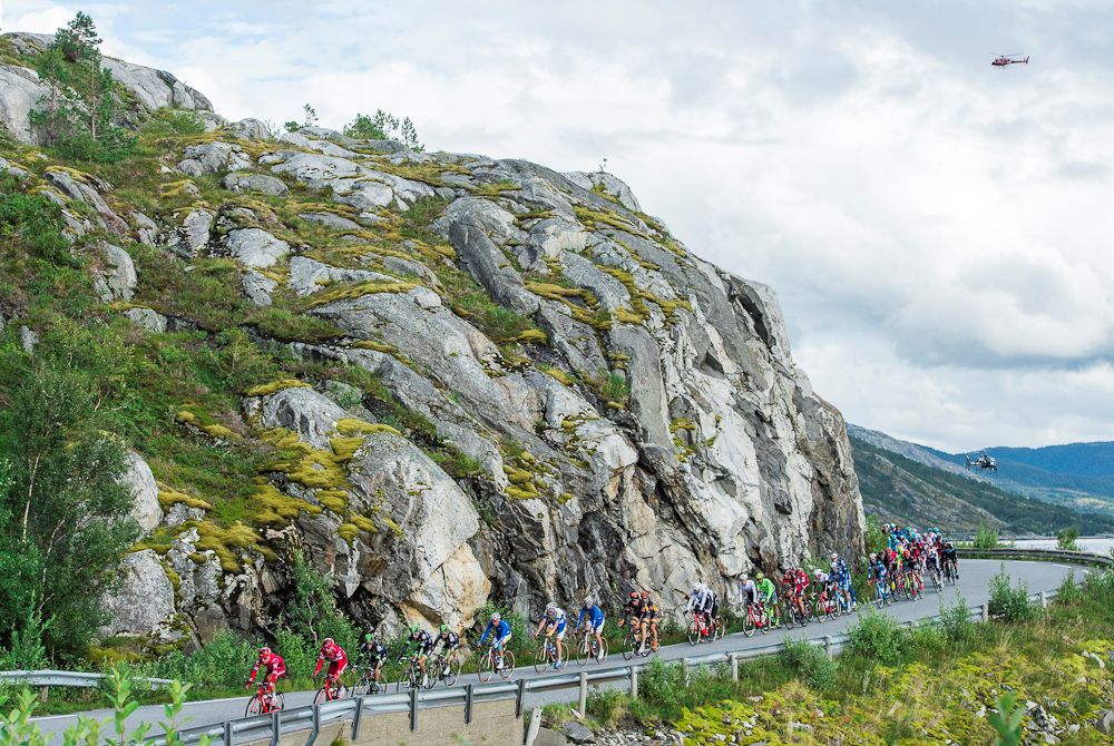 Cyclists ride during the 198,5 km second stage of the Arctic Race of Norway between Mo i Rana and Sandnessjoen
