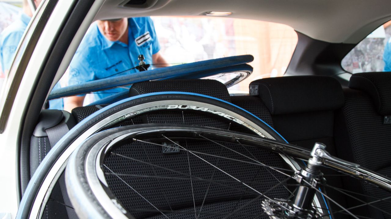 With all the spares, it's a cozy fit for the mechanic in the rear of the car. Certainly no space to stretch your legs during the day