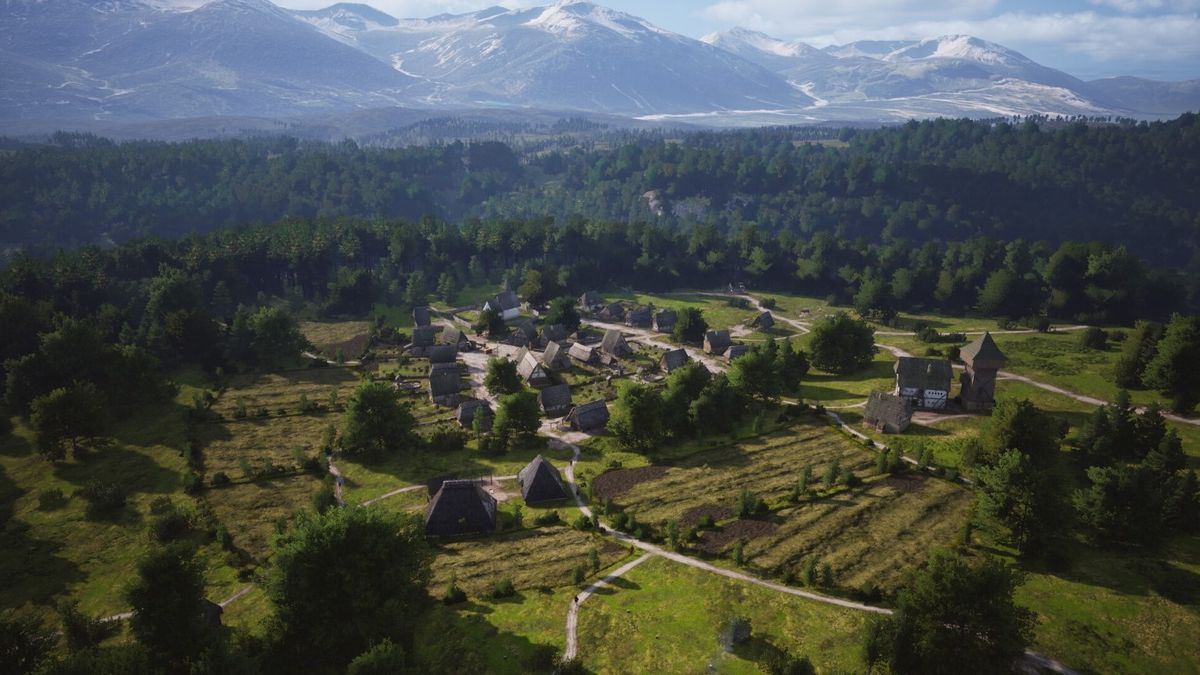 A settlement surrounded by a forest in Manor Lords.