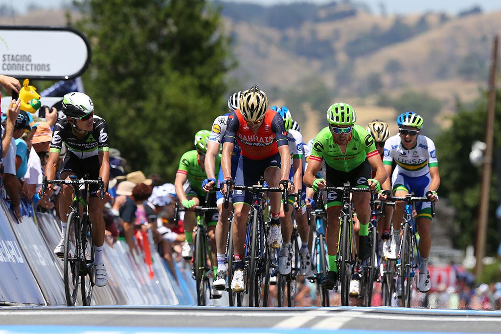 Lachlan Morton looks across to see who is finishes with