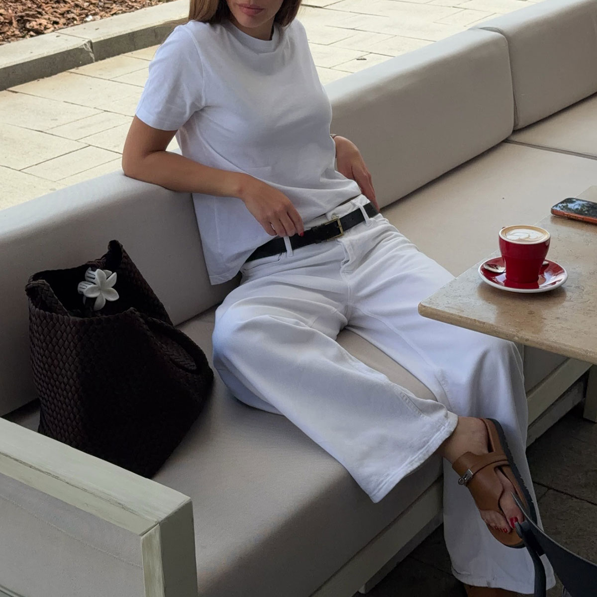 @by_eva_ outfit closeup in white tee and white jeans with black belt