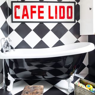 black and white bathroom with chequerboard tiles