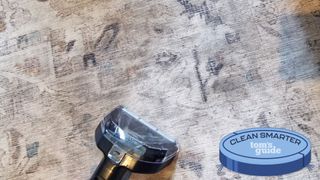 Bissell SpotClean HydroSteam being used on carpet