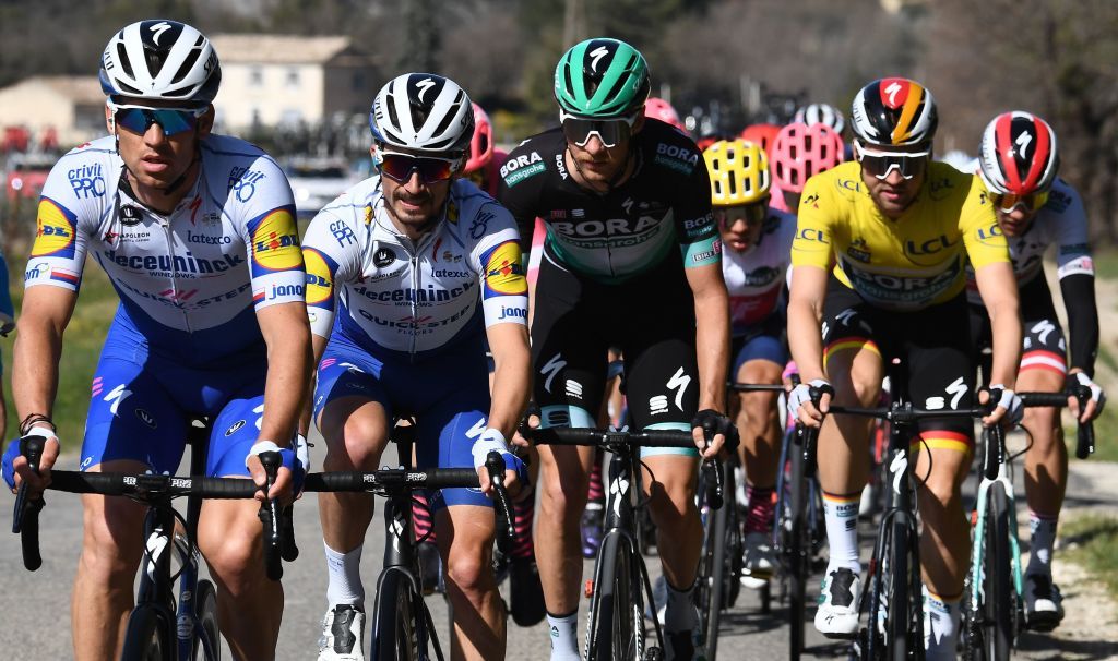 Deceuninck Quick Step French rider Julian Alaphilippe 2nd L rides ahead of BORA hansgrohe Austrian rider Felix Grosschartner C and BORA hansgrohe German rider Maximilian Schachmann R overall leader yellow jersey during the 1615 km 6th stage of the 78th Paris Nice cycling race stage between Sorgues and Apt on March 13 2020 The organizers of the 78th ParisNice cycling race announced on March 13 2020 the cancellation of the last stage scheduled for Sunday due to the coronavirus pandemic Photo by Alain JOCARD AFP Photo by ALAIN JOCARDAFP via Getty Images