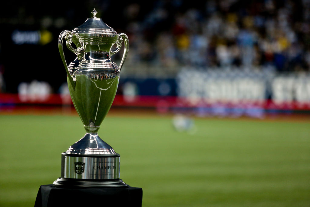 The Lamar Hunt US Open Cup Final trophy rest on the field before a game between the Seattle Sounders FC and Sporting Kansas City at Livestrong Sporting Park on August 8, 2012 in Kansas City, Kansas.