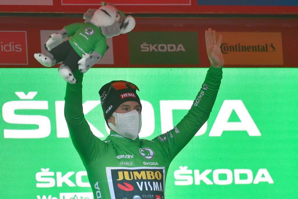 Team Jumbo rider Slovenias Primoz Roglic celebrates wearing the green jersey on the podium after the 3rd stage of the 2020 La Vuelta cycling tour of Spain a 1661 km race from Lodosa to La Laguna Negra Vinuesa on October 22 2020 Photo by ANDER GILLENEA AFP Photo by ANDER GILLENEAAFP via Getty Images