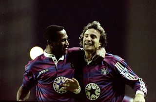 Les Ferdinand and David Ginola of Newcastle United celebrate Ginola's goal during an FA Carling Premiership match against Tottenham Hotspur at White Hart Lane in London. The match ended in a 1-1 draw.