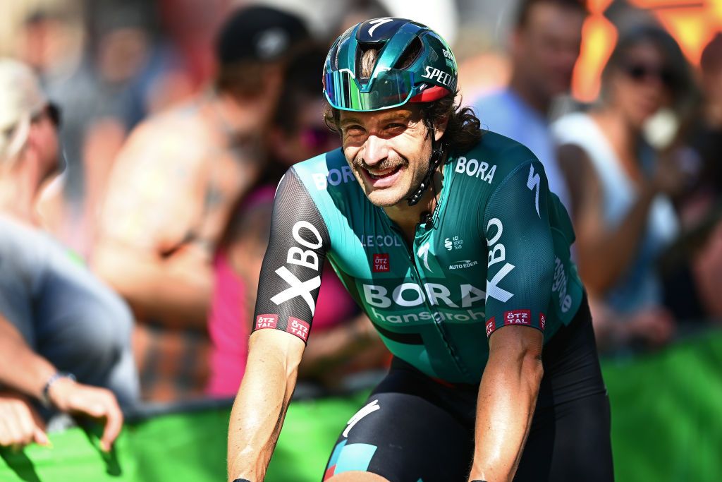HAMBURG GERMANY AUGUST 21 Marco Haller of Austria and Team Bora Hansgrohe celebrates at finish line as race winner during the 25th BEMER Cyclassics Hamburg 2022 a 2047km one day race from Hamburg to Hamburg 25YearsOfCycling WorldTour on August 21 2022 in Hamburg Germany Photo by Stuart FranklinGetty Images