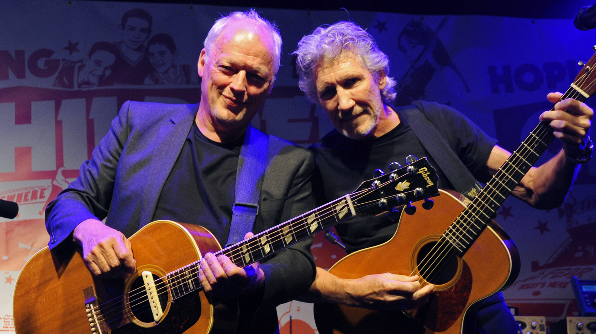LONDON, ENGLAND - JULY 10: (NO UK MONTHLY MAGAZINES OR EQUIVALENT ONLINE SITES - NO UK EDITIONS OF HELLO OR OK MAGAZINES - EMBARGOED FOR PUBLICATION IN UK TABLOID NEWSPAPERS UNTIL 48 HOURS AFTER CREATE DATE AND TIME. MANDATORY CREDIT PHOTO BY DAVE M. BENETT/GETTY IMAGES REQUIRED) David Gilmour (L) and Roger Waters perform at a benefit evening for The Hoping Foundation on July 10, 2010 in London, England. 