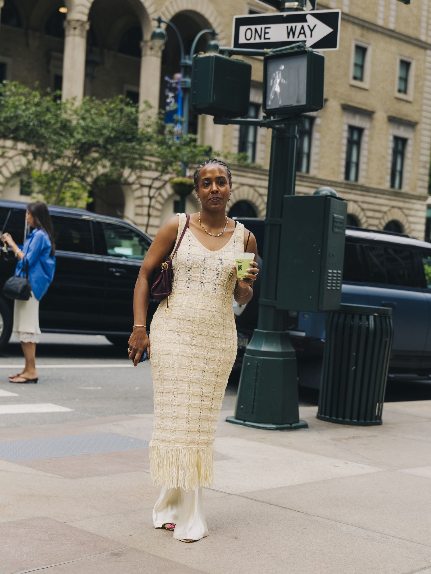 NYFW street style outfit featuring a fringe dress.