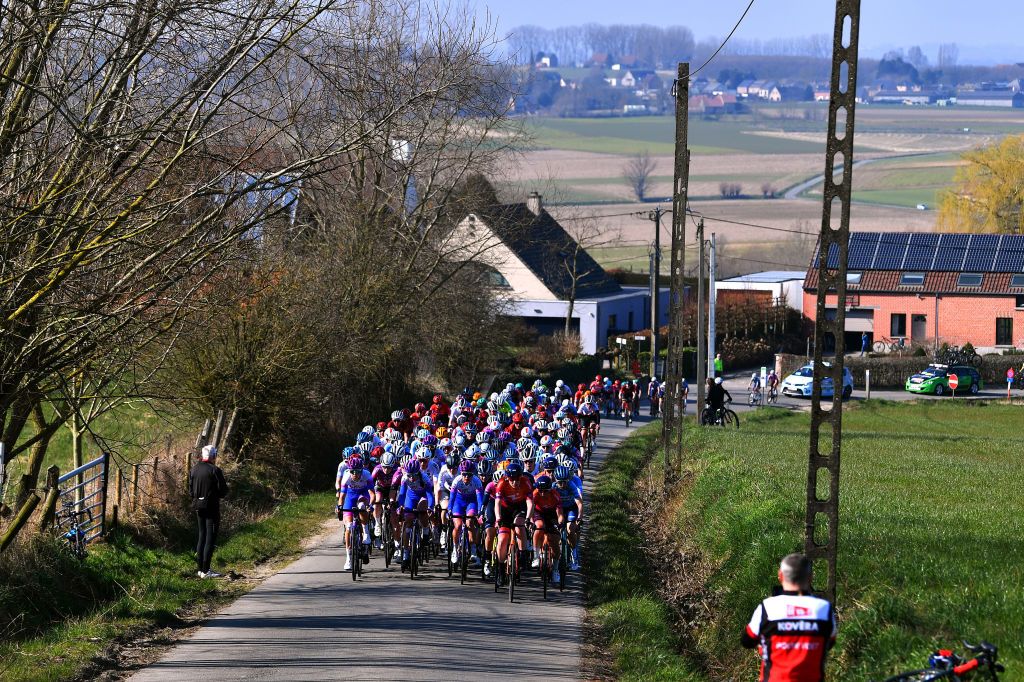 OETINGEN BELGIUM MARCH 09 A general view of the peloton passing through a landscape during the 2nd GP Oetingen 2022 Womens Elite a 130km one day race from Oetingen to Oetingen gpoetingen on March 09 2022 in Oetingen Belgium Photo by Luc ClaessenGetty Images