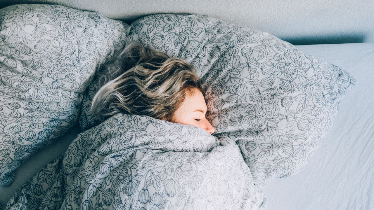 woman sleeping in bed