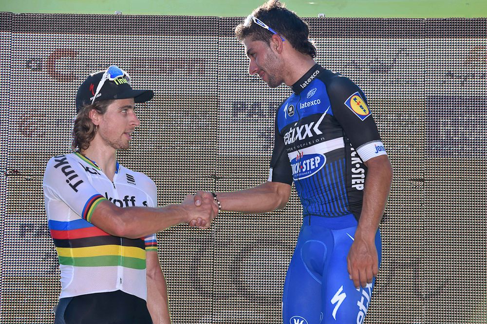 Peter Sagan greets Fernando Gaviria on the stage 2 podium.