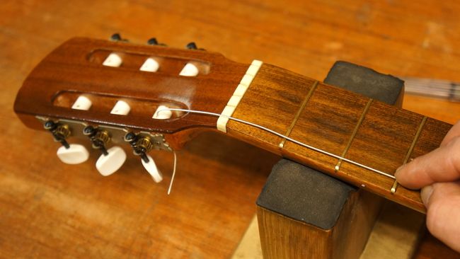How to restring a classical guitar | Guitar World