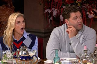 trishelle cannatella and ct tamburello sit at the breakfast table with shocked expressions, on 'the traitors' season 2