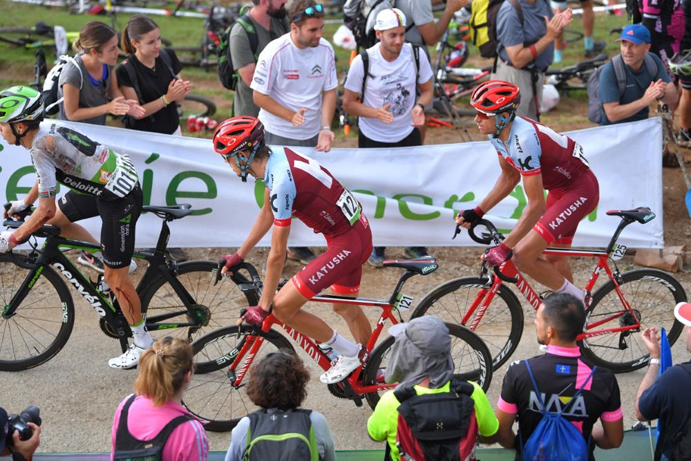 Crash victim Louis Meintjes and Ilnur Zakrin fight their way to the finish