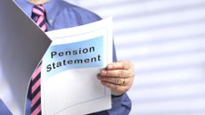 A man looks at his pension statement.