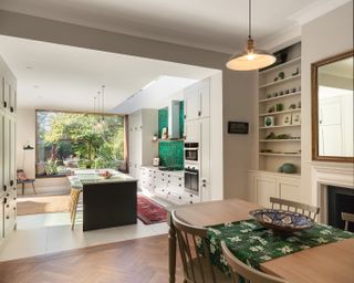 extension cost calculator - modern kitchen extension with green tiles