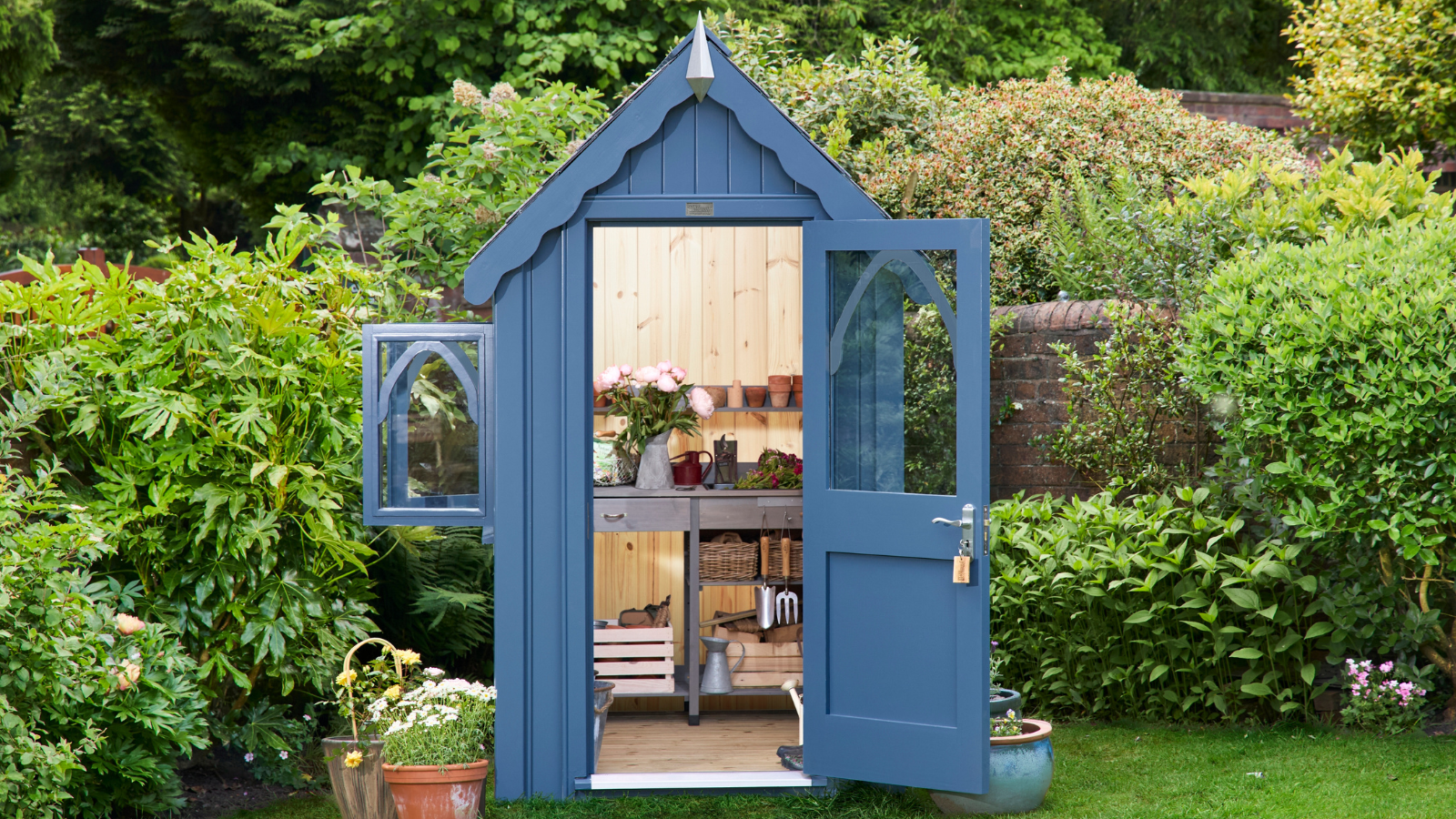 Blue shed in a garden