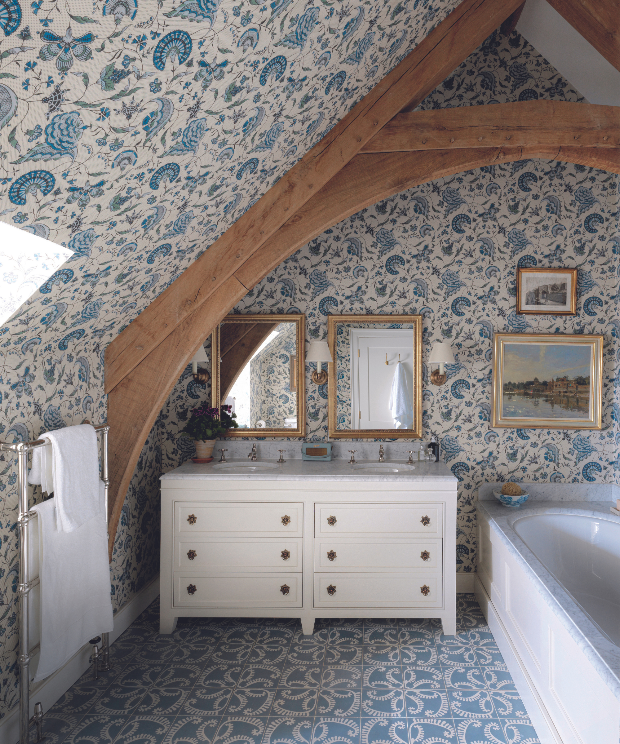 blue and white patterned wallpaper in bathroom