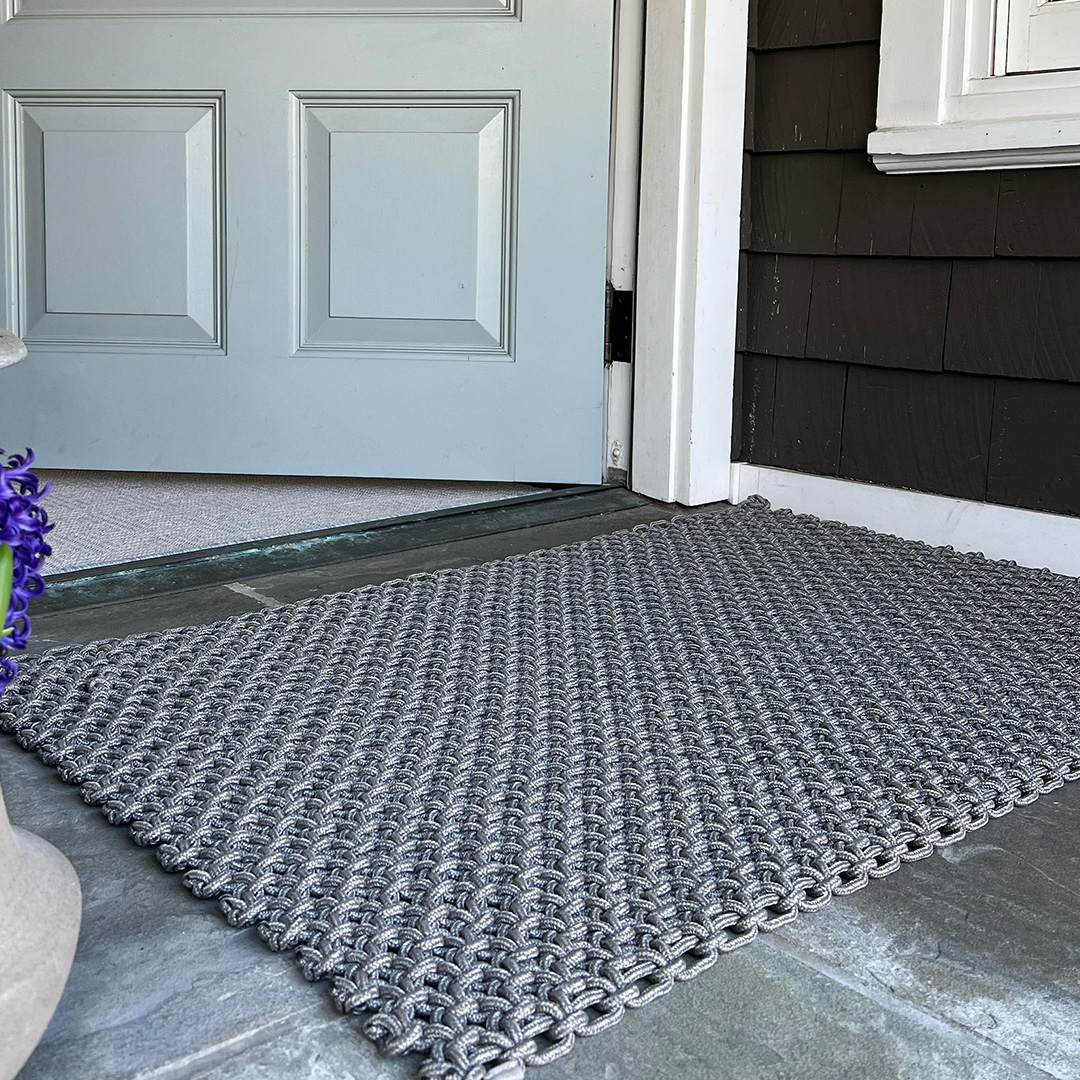Woven grayish blue outdoor door mat 