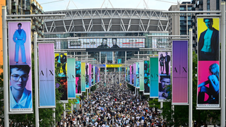 A general view of Oasis fans arriving at the Oasis Live '25 Tour at Wembley Stadium on July 25, 2025 in London, England. 