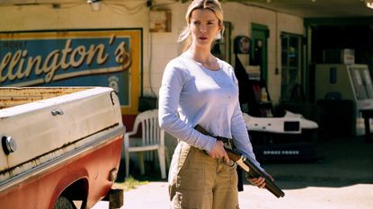 The Hunt Betty Gilpin as Crystal with a shotgun
