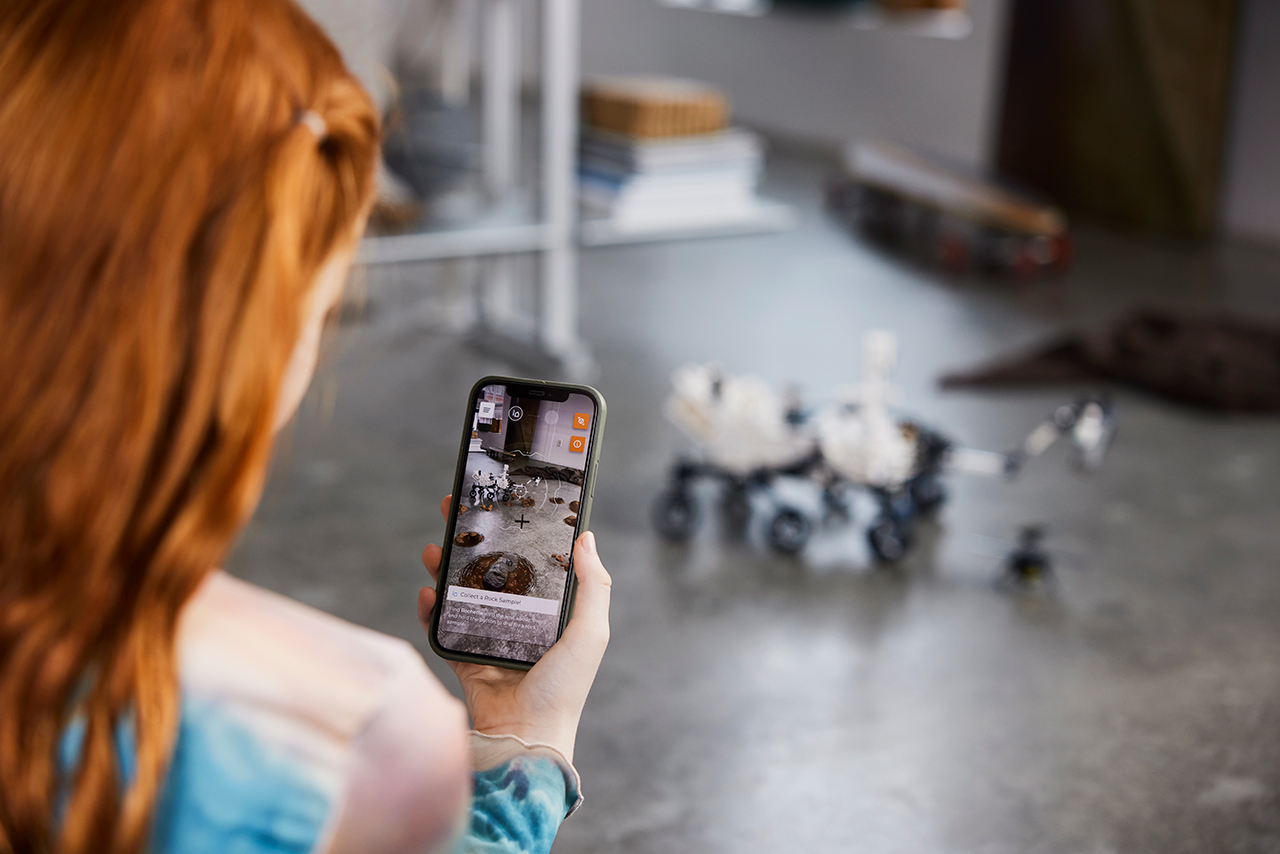 After building the Lego Technic NASA Mars Rover Perseverance model, it can then interact with an augmented reality app to learn more about the real rover's status exploring Mars' surface.