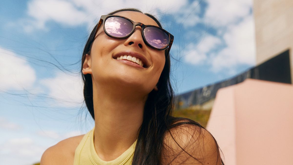 Woman wearing SunGod sunglasses