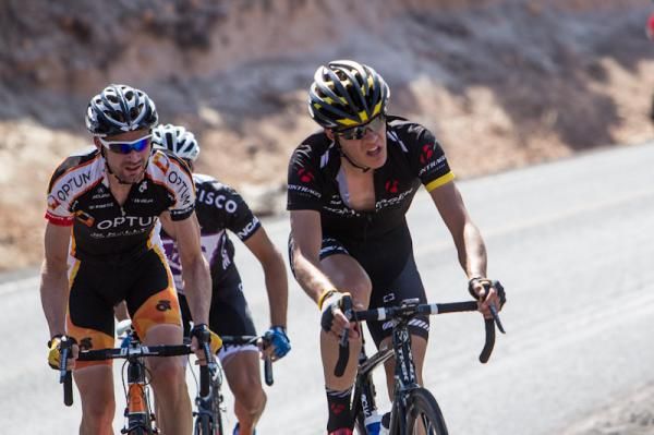Three riders get off the front of the men's field on the climb.