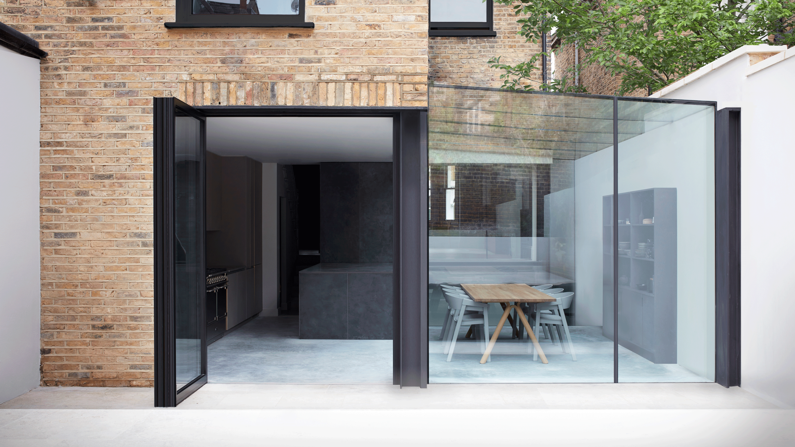 Grey kitchen with glass extension