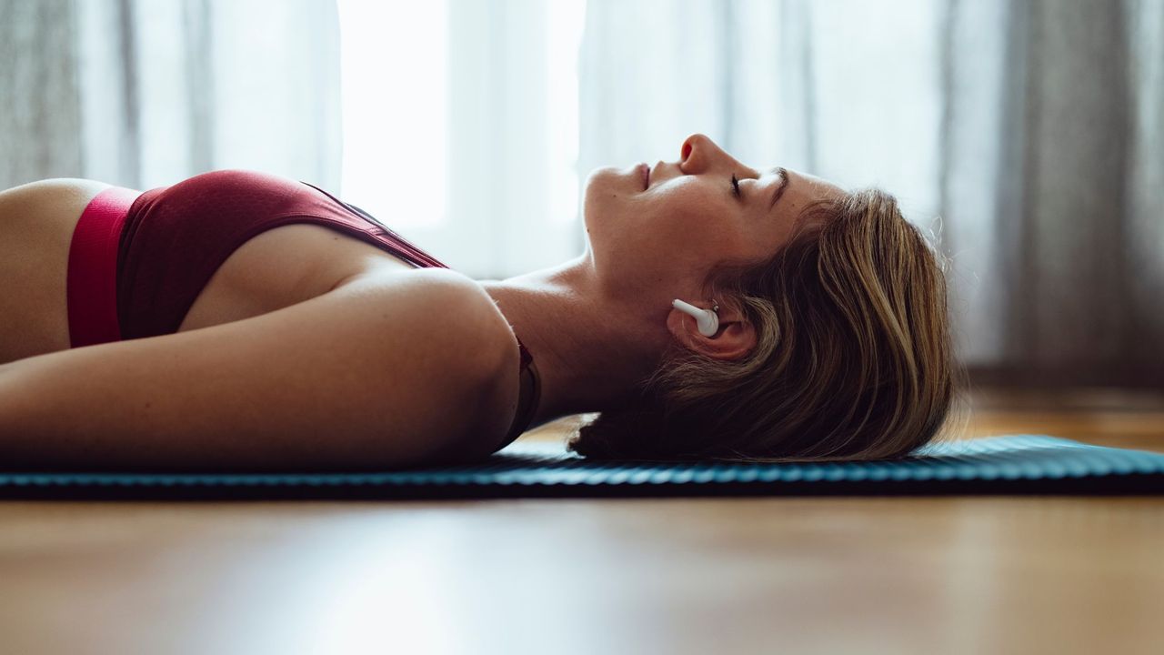 Coping techniques for anxiety: A woman meditating