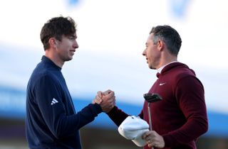 Tom McKibbin and Rory McIlroy shake hands at the Irish Open