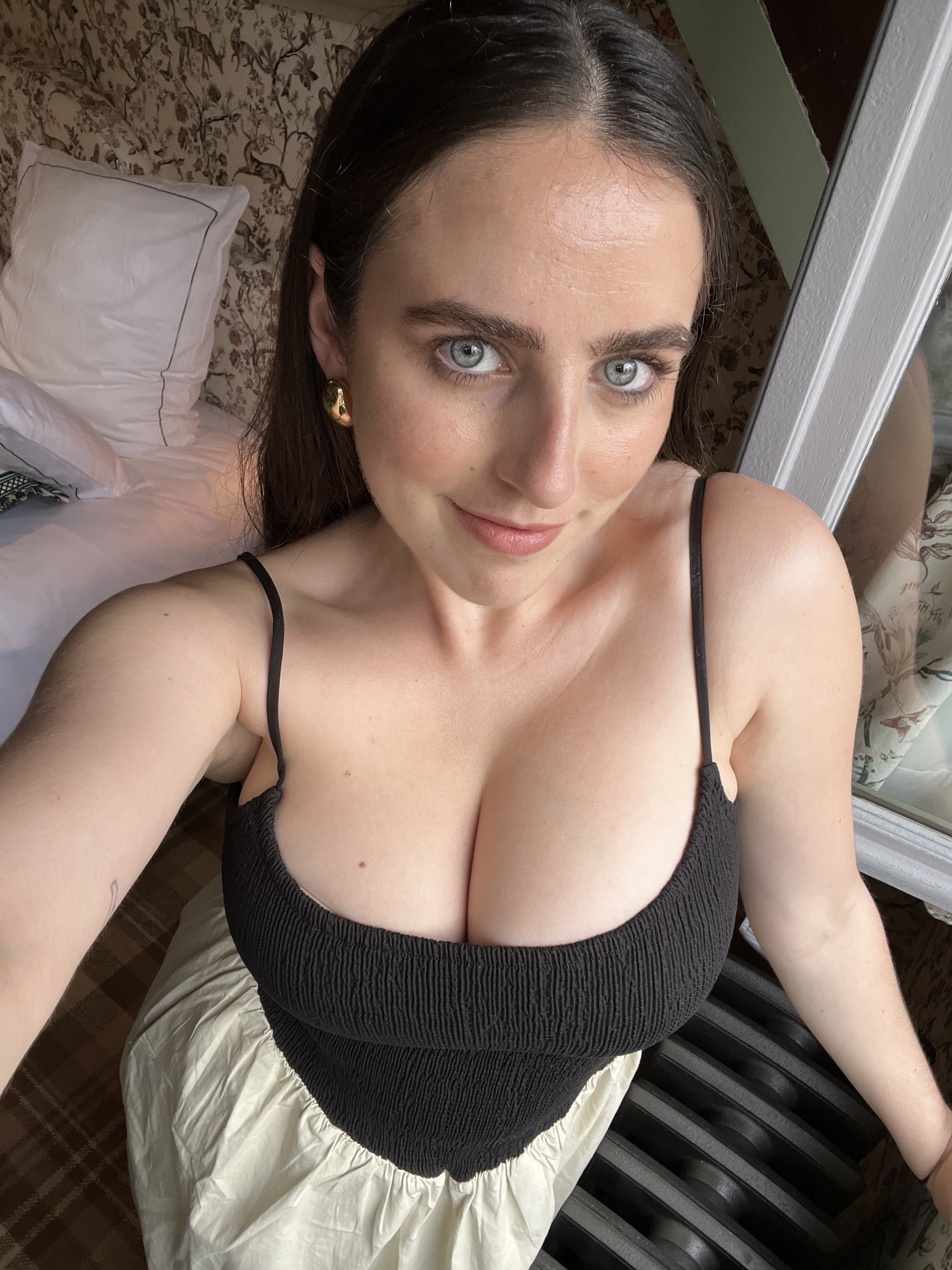 An image of Who What Wear's Ava Gilchrist wearing a DISSH dress.