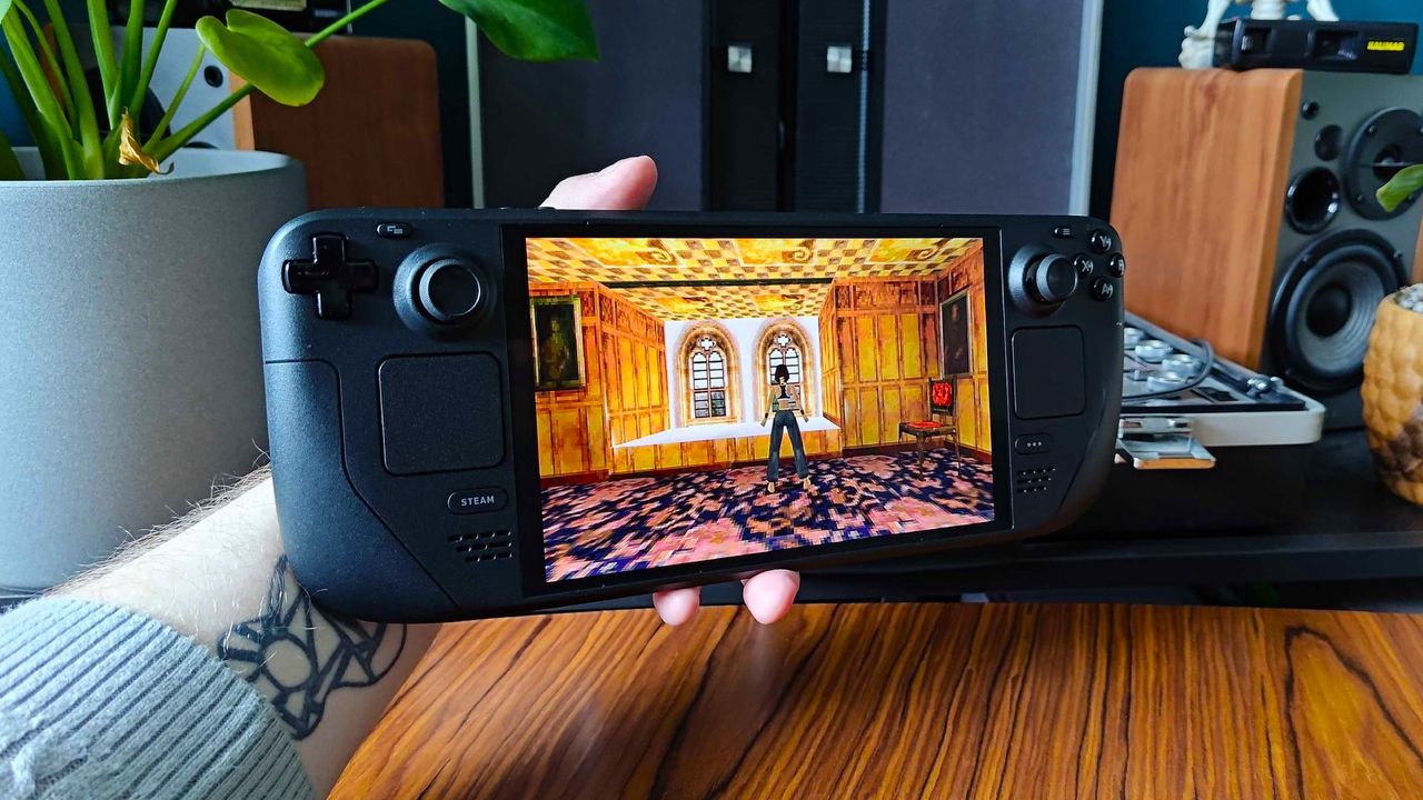Steam Deck OLED running Tomb Raider 2 Remastered with Lara standing in bedroom