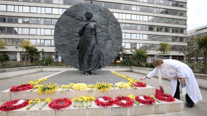 Flowers are placed near the statue of Crimean War nurse Mary Seacole