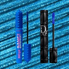 an edit of two tubes of blue mascara sitting on a bright blue background