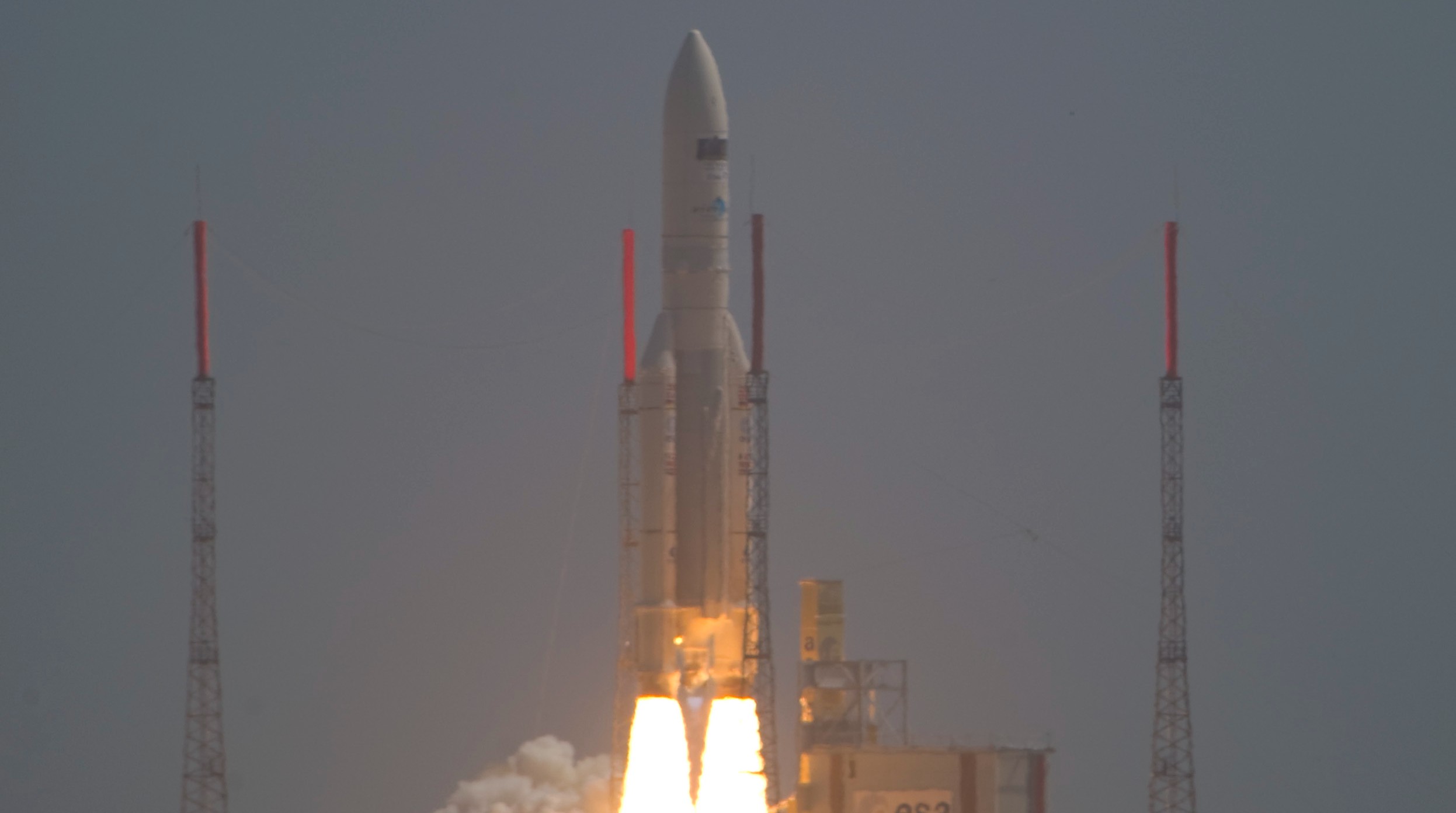 a white ariane 5 rocket launches from french guiana on may 14, 2009