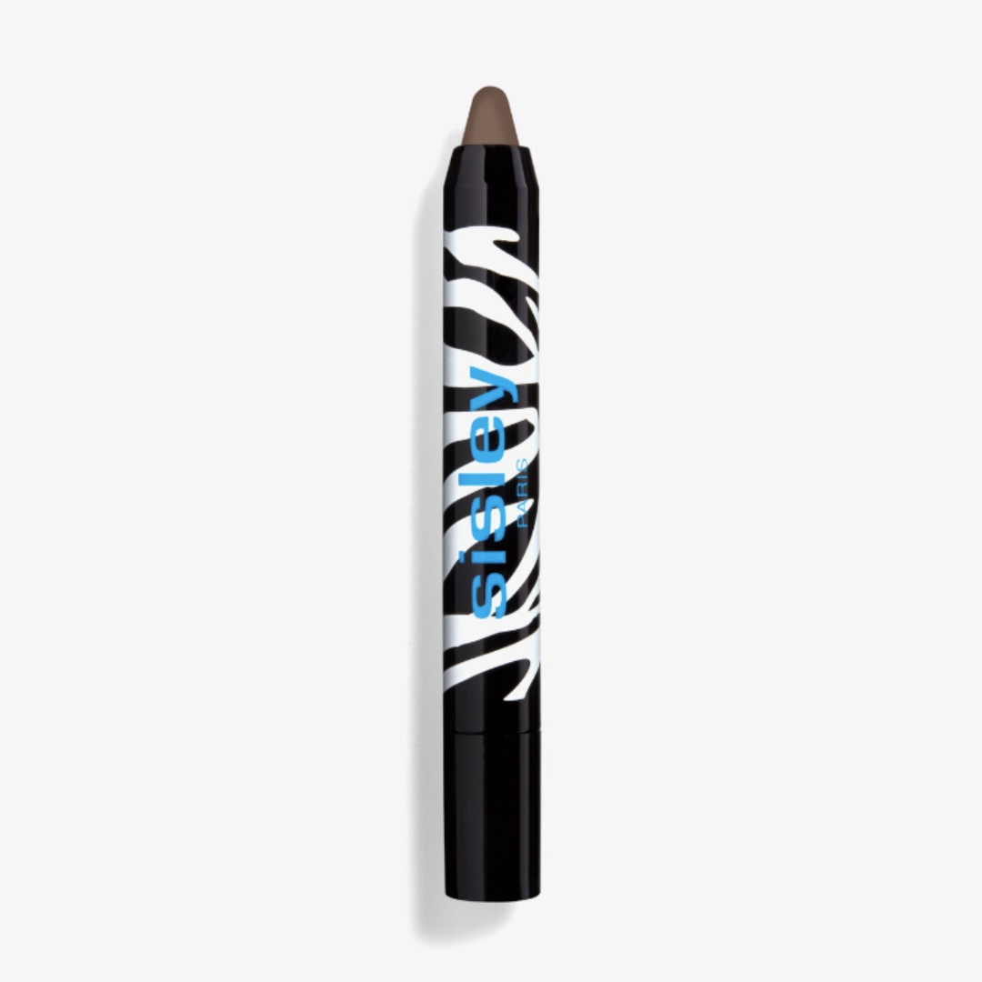 A product shot of the Sisley Phyto-Eye Twist eyeshadow stick, on a grey background
