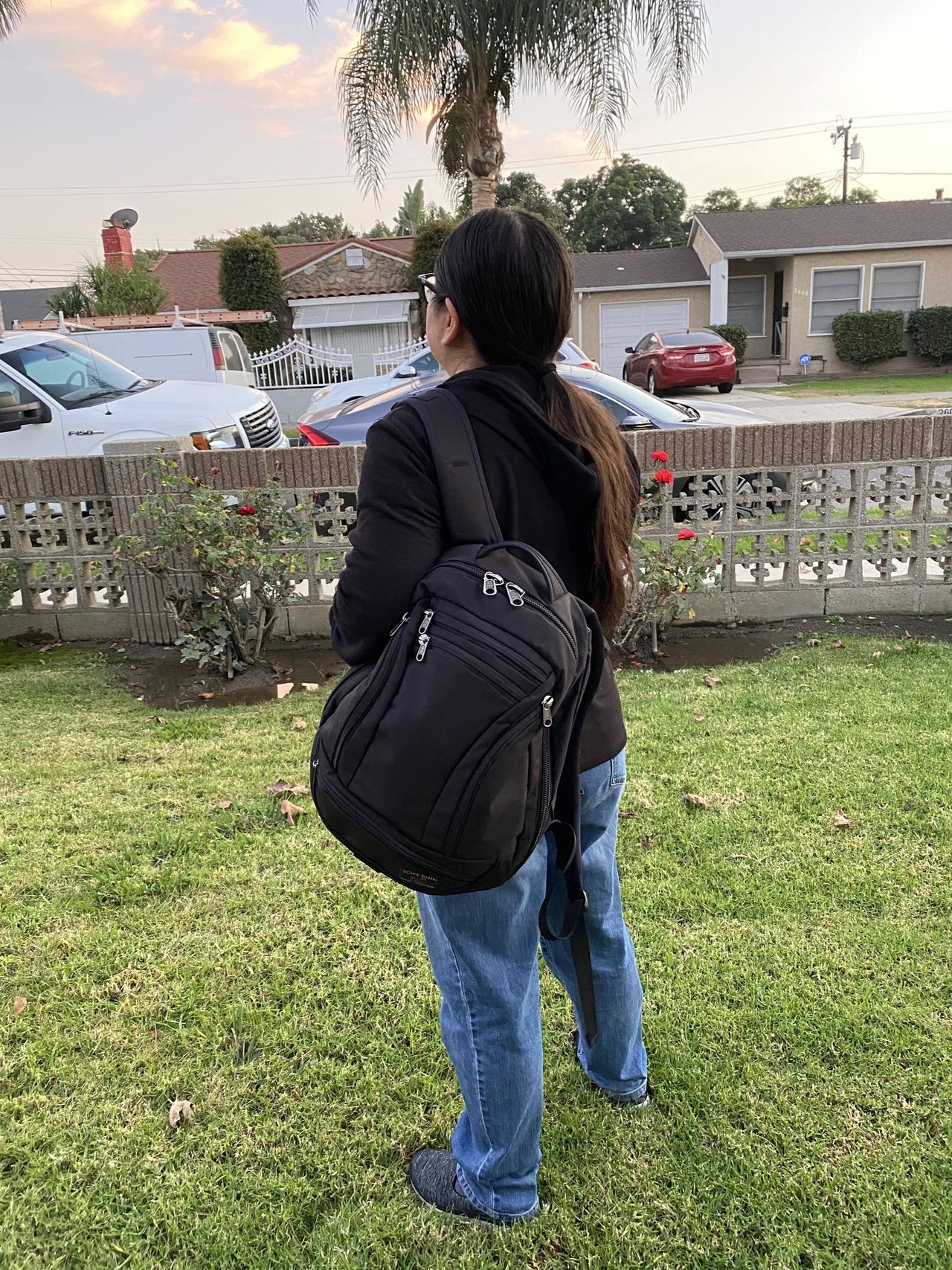 Christine carries the Synik on one shoulder