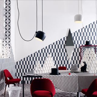 room with geometric pattern printed wall in black and white