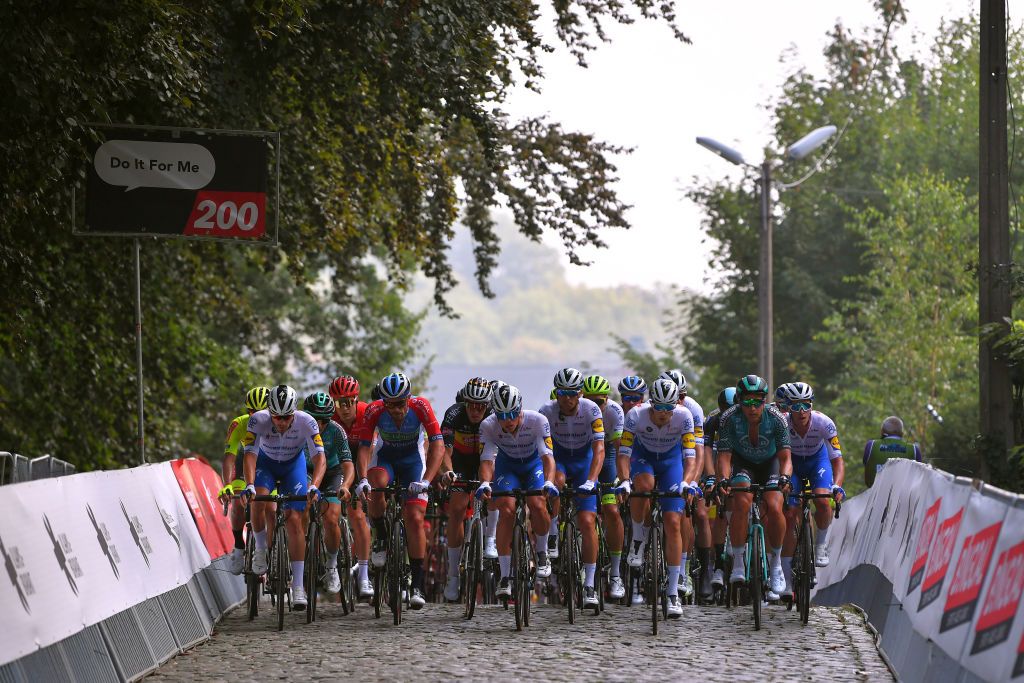 DIEST BELGIUM AUGUST 15 Florian Senechal of France and Team Deceuninck QuickStep Thijs Aerts of Belgium and Team Telenet Lions Stijn Steels of Belgium and Team Deceuninck QuickStep Zdenek Stybar of Czech Republic and Team Deceuninck QuickStep Jannik Steimle of Germany and Team Deceuninck QuickStep Iljo Keisse of Belgium and Team Deceuninck QuickStep Cobblestones Peloton during the 17th Dwars door het Hageland 2020 a 187km race from Aarschot to Diest DwarsdhHageland DDHH20 on August 15 2020 in Diest Belgium Photo by Luc ClaessenGetty Images