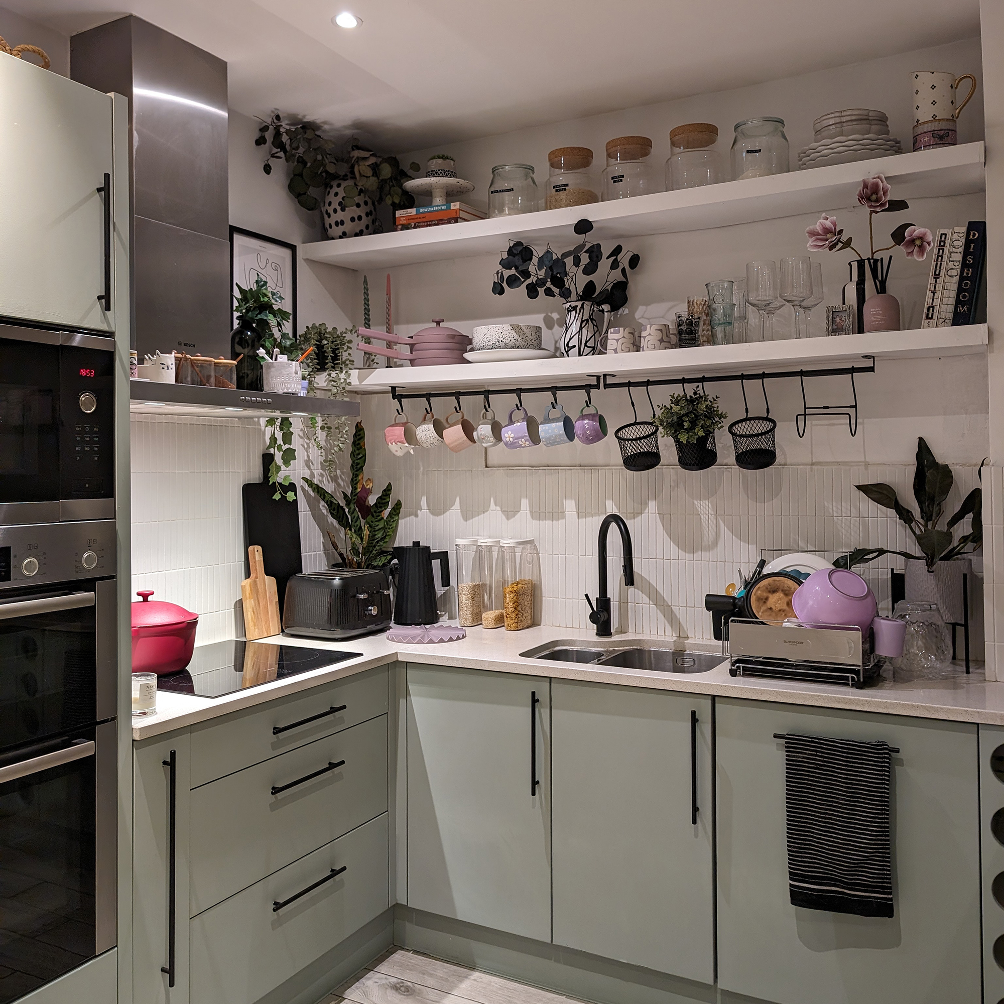 kitchen with open shelves and jars on display