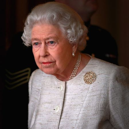 Queen Elizabeth looking out a window 