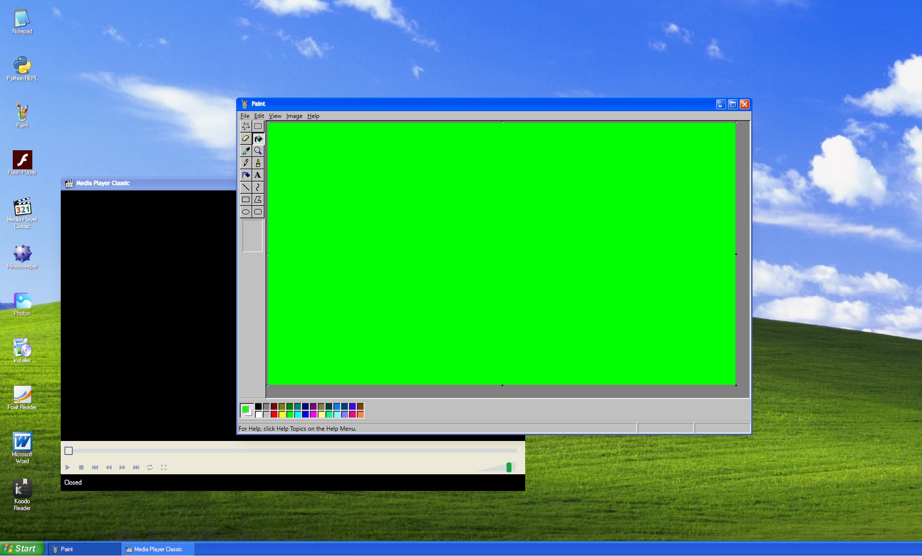 Windows XP with a green screen Paint window