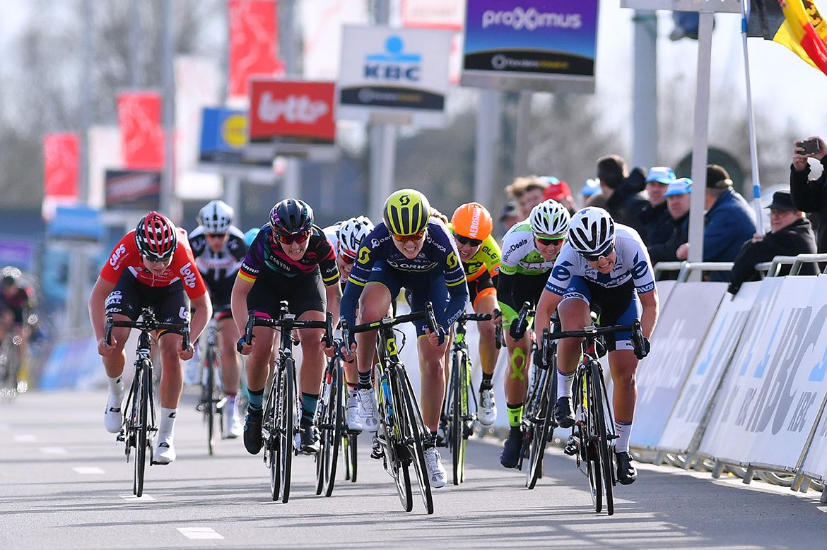 The women's Dwars door Vlaanderen won by Lotta Leposto (right)