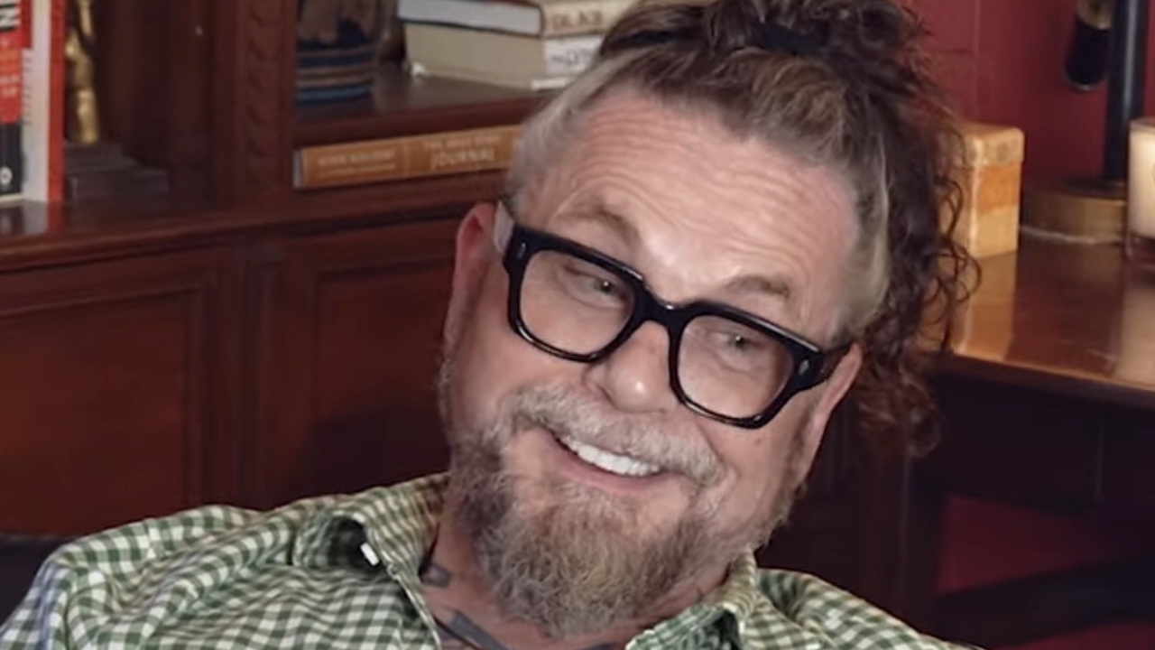 Kurt Sutter smiling while filming PIE podcast with Katey Sagal.