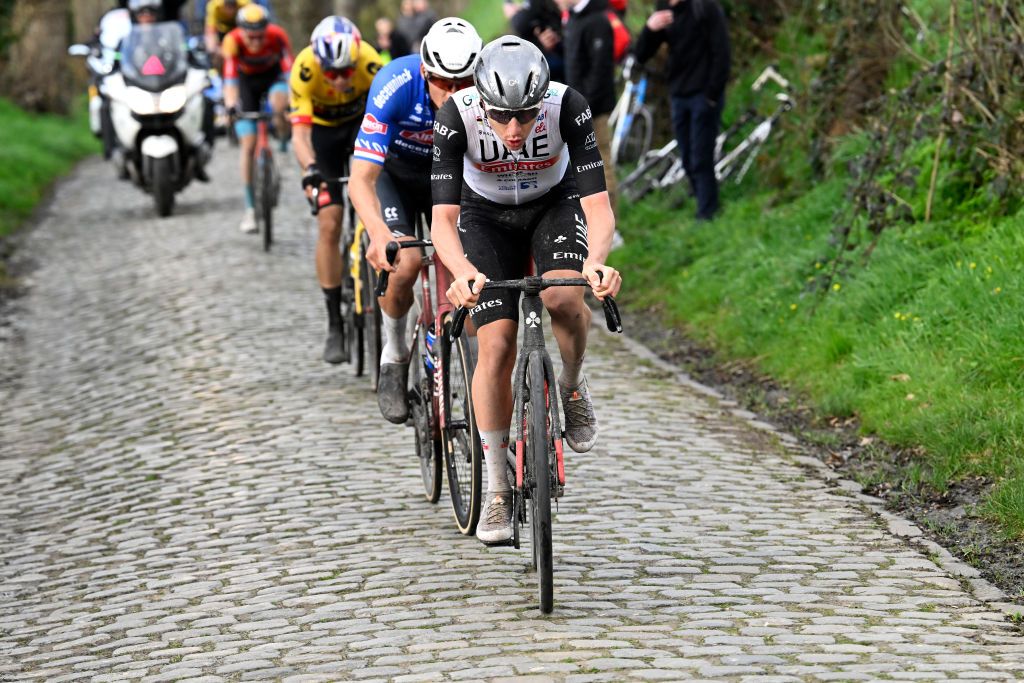 HARELBEKE, BELGIUM - MARCH 24 : Pogacar Tadej (SVN) of UAE Team Emirates attacking on Kwaremont during the 66th Saxo Bank classic E3 Harelbeke UCI World Tour cycling race with start and finish in Harelbeke on March 24, 2023 in Harelbeke, Belgium, 24/03/2023 ( Motordriver Kenny Verfaillie &amp; Photo by Nico Vereecken / Photo News
